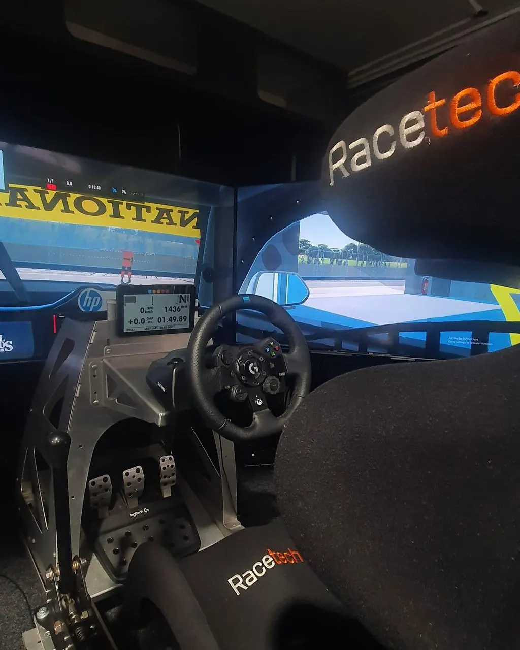 Testing our first triple-screen Racetech rig at the workshop before Spark Game Arena Live, 2024