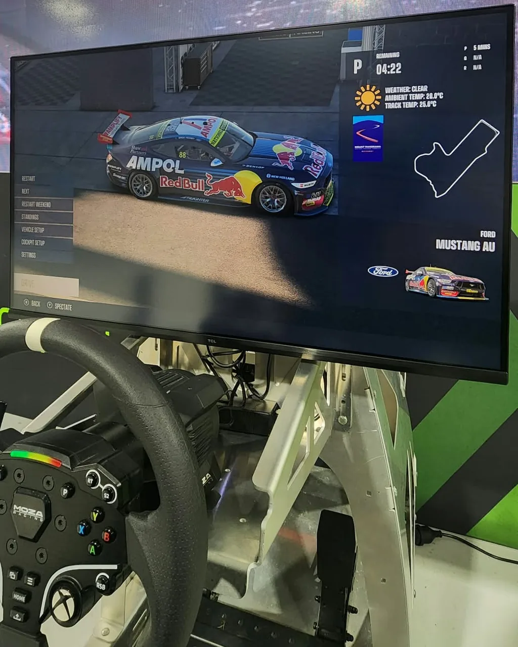 The Red Bull Ampol Gen3 Supercar Mustang livery on the TCL 32G64, colours staying punchy in a bright room